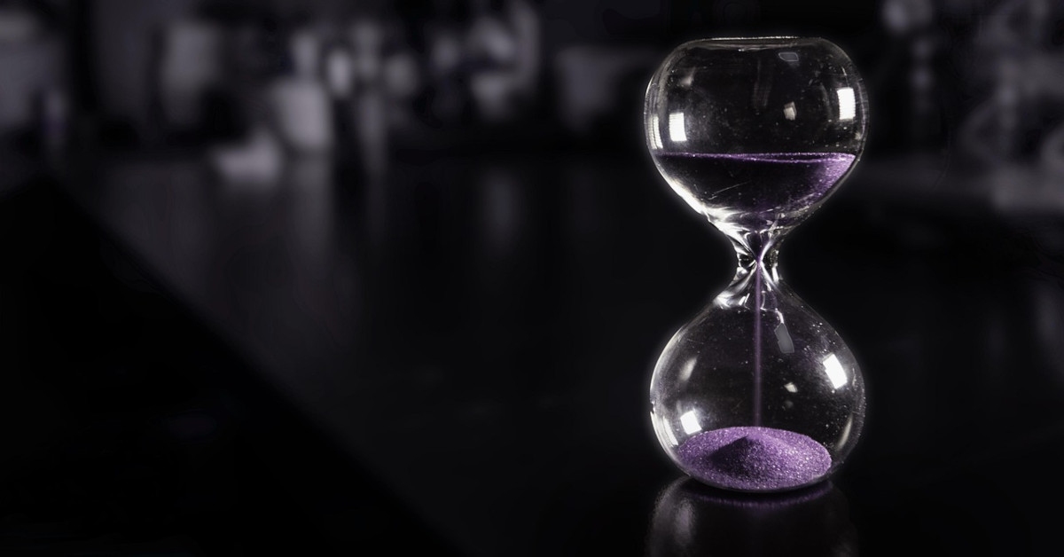 Image of an hourglass with sand dropping, indicating that time keeps ticking.