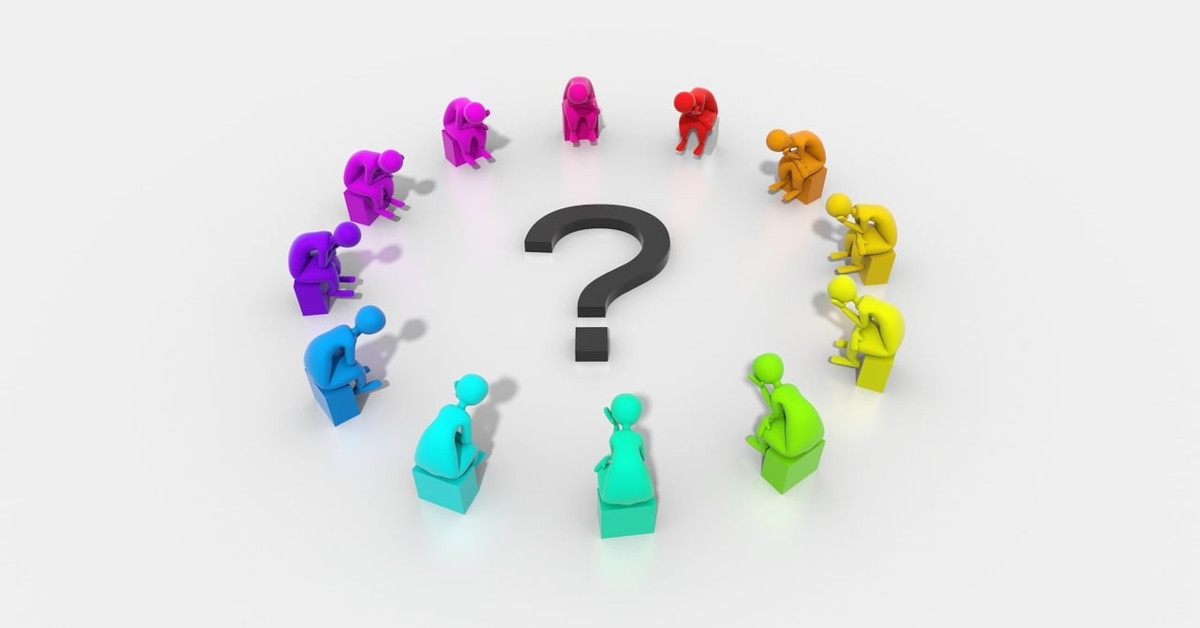 An illustration of a question mark with colored people sitting around it.