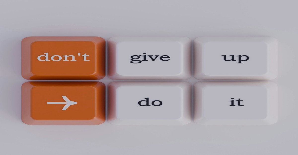 "Don't give up --> do it" keyboard keys.