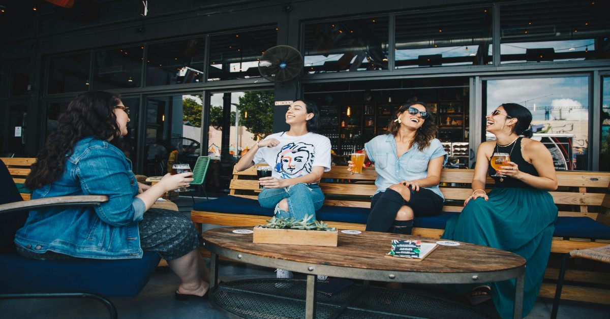 A group of friends is talking and socializing.