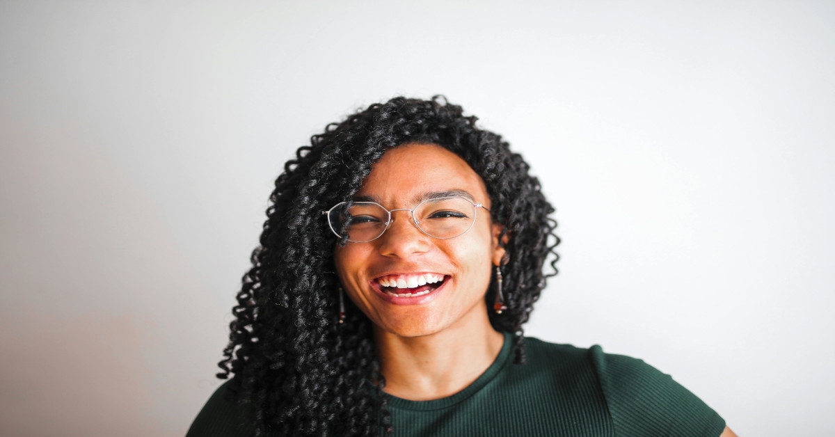 A happy woman smiling.