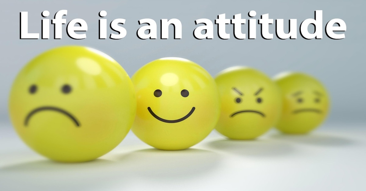 One happy smiley in between sad smileys with the sentence "life is an attitude" written above it.