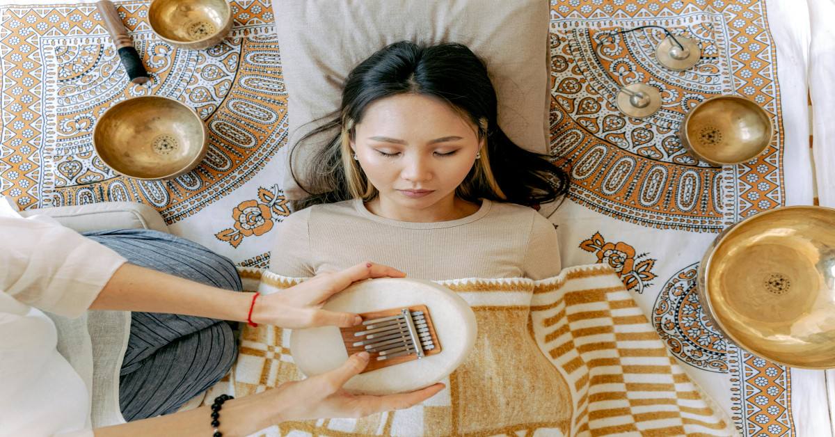 A woman engaging in music therapy to relax.