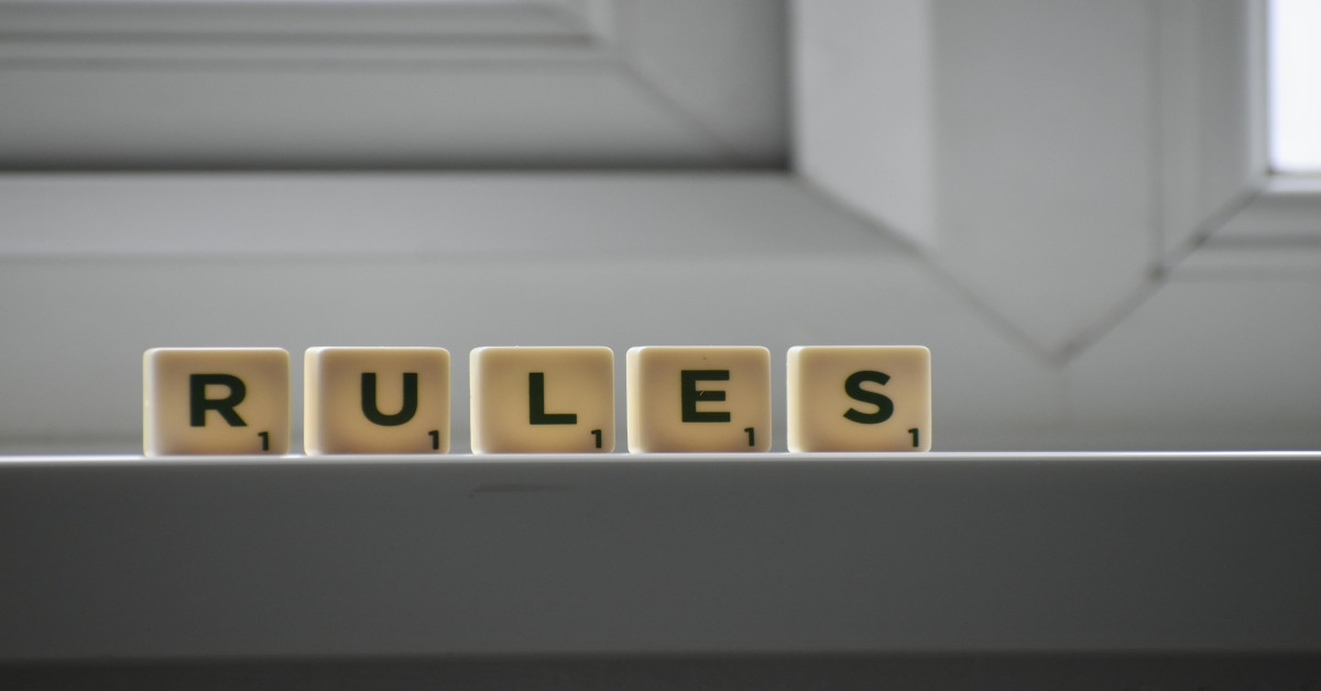 The word "rules" made with letter blocks.