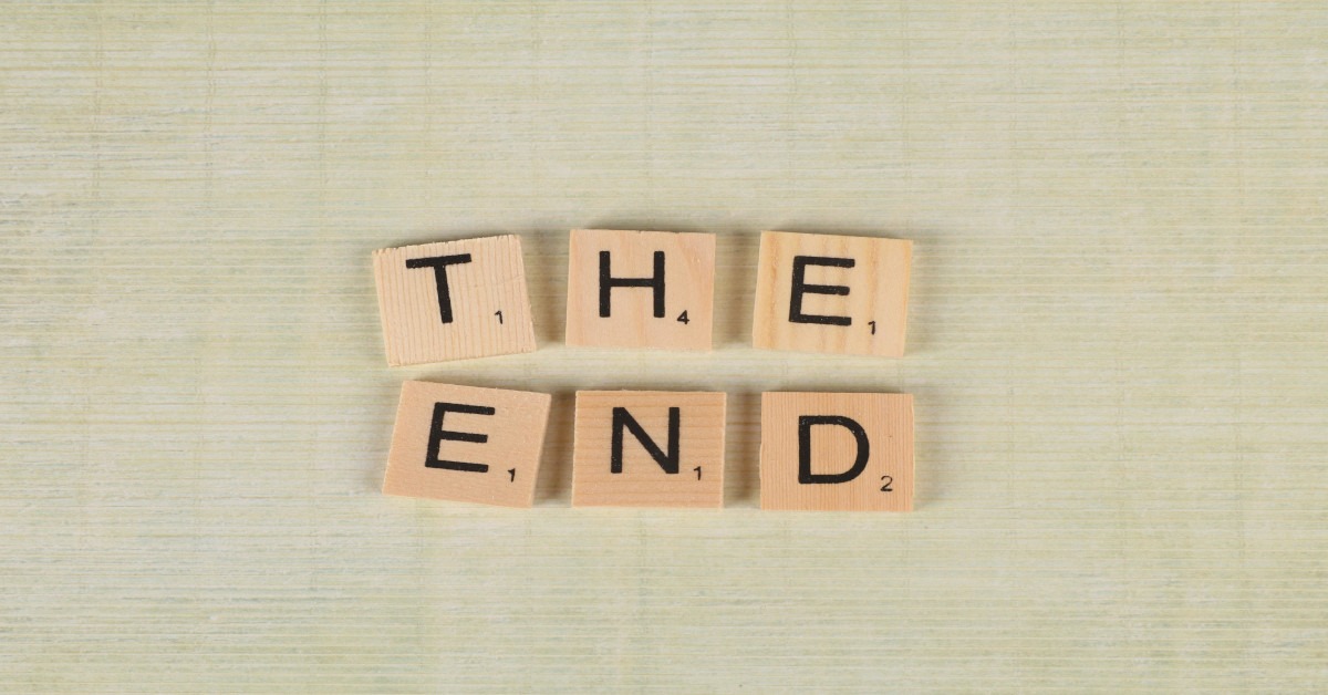 The sentence, "the end" made with Scrabble blocks.
