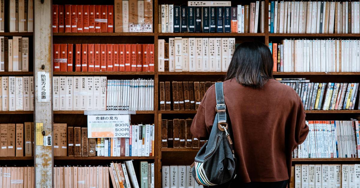 A woman in a library.