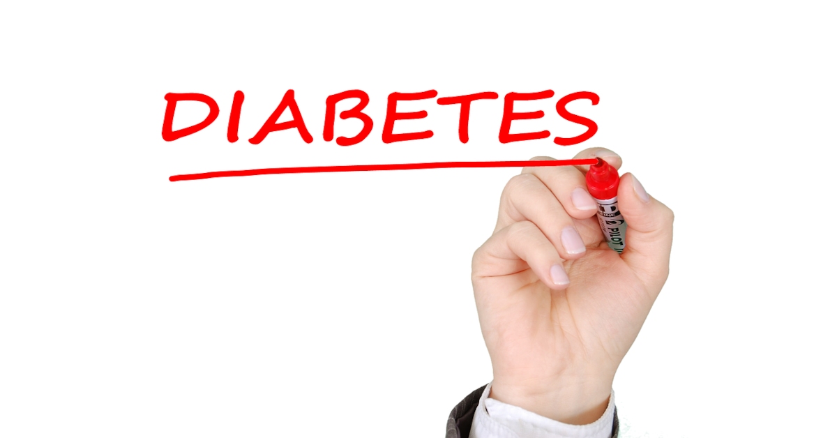 The word "diabetes" written in red letters with a red marker on a white background.