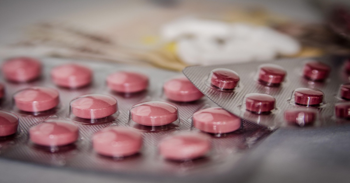 Image of red pill strips.